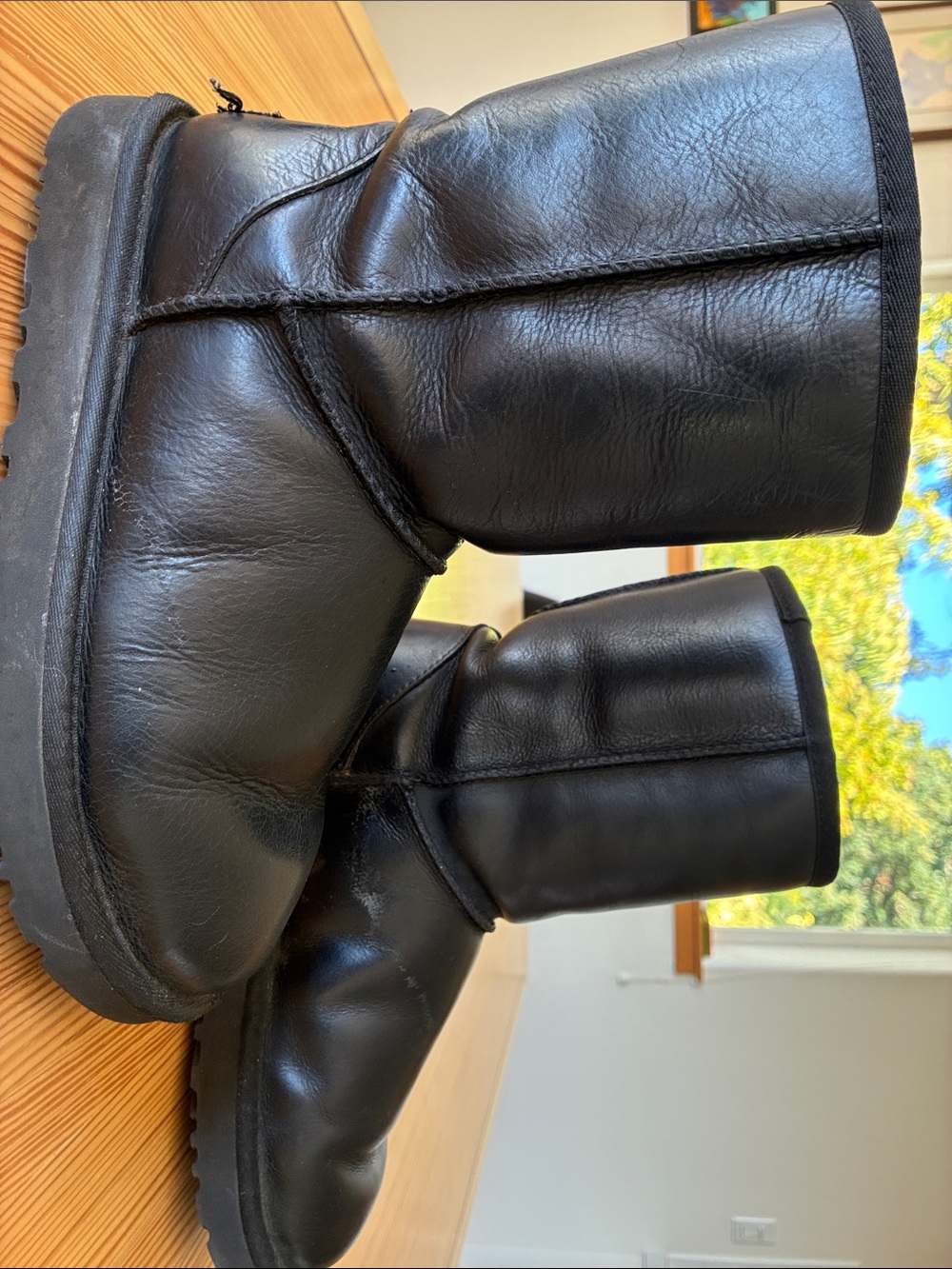 UGG women’s Black Leather Short Boots